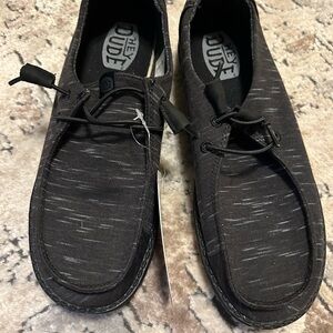 Woman’s new Hey Dude slippers 9W